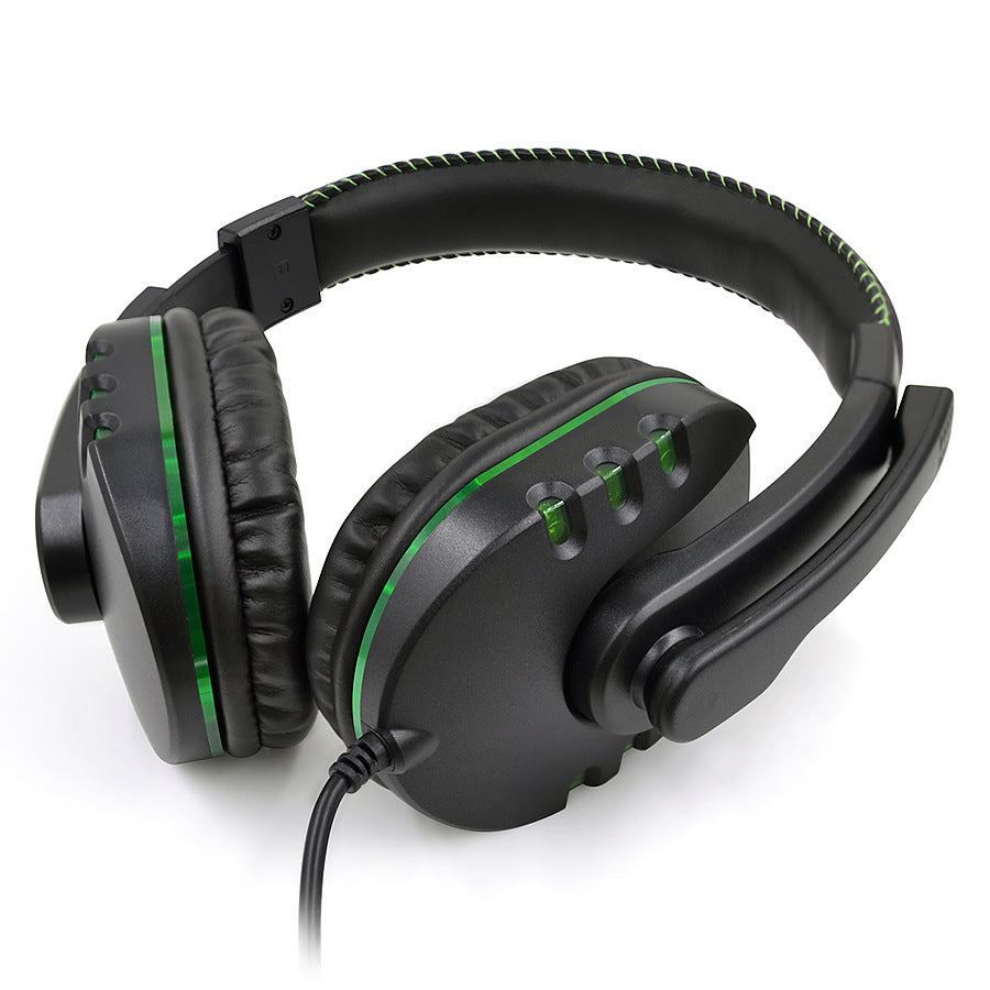 Black wired USB gaming headset with green accent details